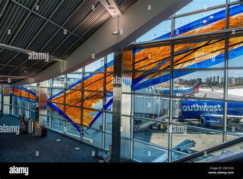 Passengers Waiting In The Terminal Concourse For Southwest Airlines At