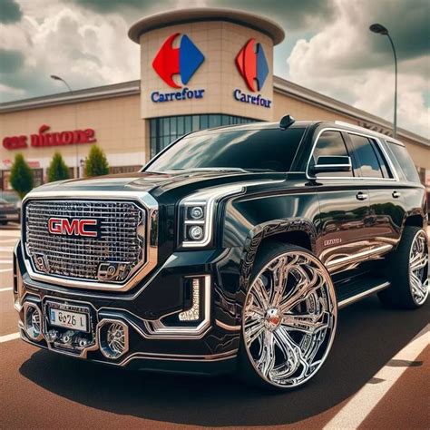 Black Cadillac Truck at Car Dealership