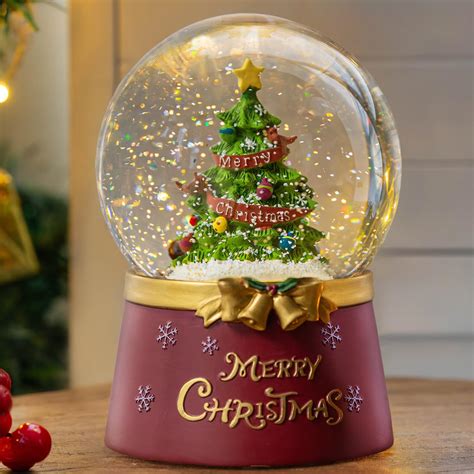 Amazon Melrose International Lighted Musical Snow Globe Carolers