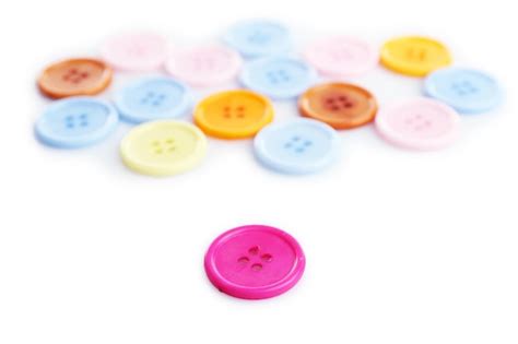 Premium Photo | Colorful buttons isolated on white