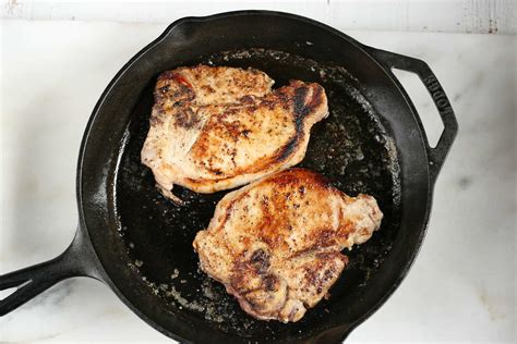 Juicy Cast Iron Pork Chops Recipe A Farmgirl S Kitchen