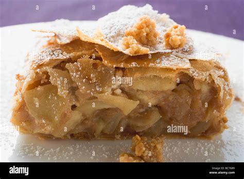 Piece Of Apple Strudel With Icing Sugar Stock Photo Alamy