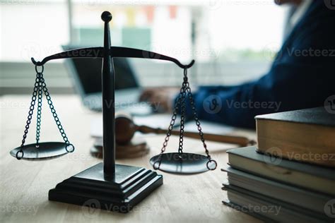 Brass Scales Are Placed On Lawyers Desks In Legal Advice Offices As A