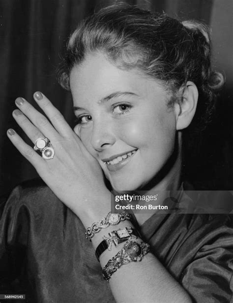 Portrait Of Actress June Thorburn Modeling A Number Of Watches And