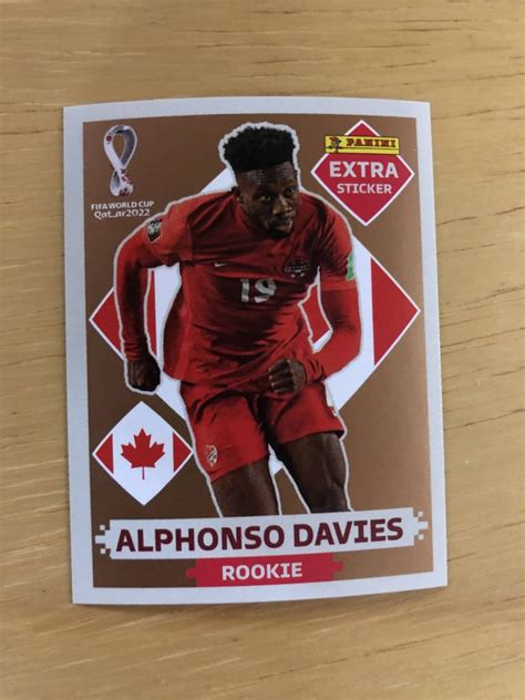 Figurinha Extra Rookie Panini Copa Do Mundo 2022 Alphonso Davies Bronze