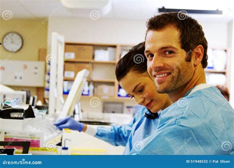 Two Laboratory Technicians Working in Hospital Lab Stock Photo - Image ...