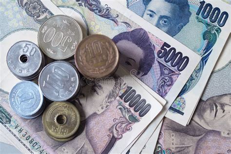 Billetes De Yen Japoneses Y Monedas De Yenes Japoneses Por Concepto De