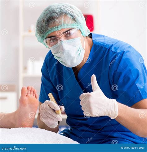 Podiatrist Treating Feet during Procedure Stock Image - Image of laser