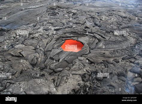 A standalone lava skylight on the Puʻu ʻŌʻō crater at K lauea Hawaii