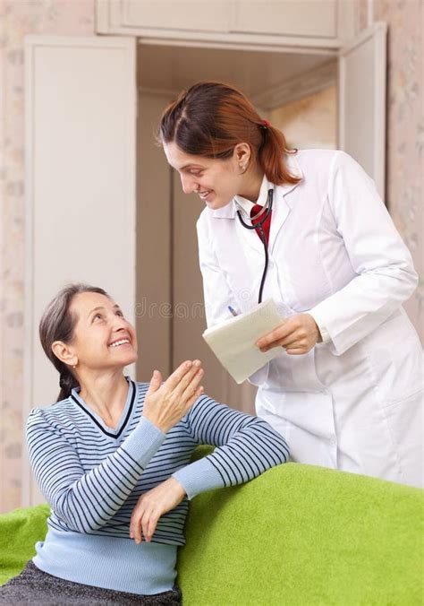 Friendly Doctor Talks Happy Mature Woman Stock Photos Free And Royalty