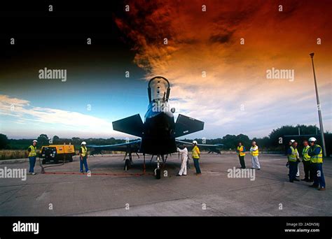 Typhoon fighter plane and a ground crew preparing for a test flight ...