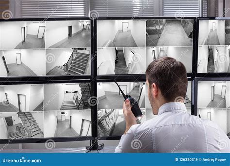 Security Guard Monitoring CCTV Footage Stock Photo - Image of room ...