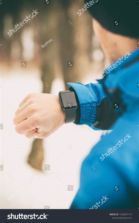 Man Looking On His Smartwatches Stock Photo 1240697119 Shutterstock