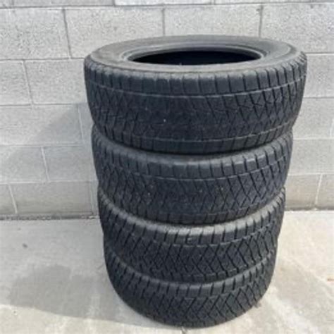 Set of 4 Bridgestone Blizzak Winter/Snow SUV Tires | Live and Online Auctions on HiBid.com