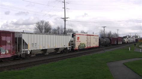 BNSF 7030 And UP 3937 Lead Mixed Freights Old Town Tacoma WA W Canon