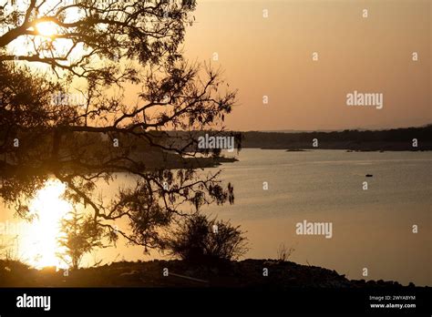 Scenic sunset view of water storage at Sathanur Dam which forms the Sathanur reservoir. Sathanur ...