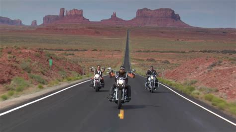 Three Harley Motorcycles Drive Desert Highway Stock Footage Sbv