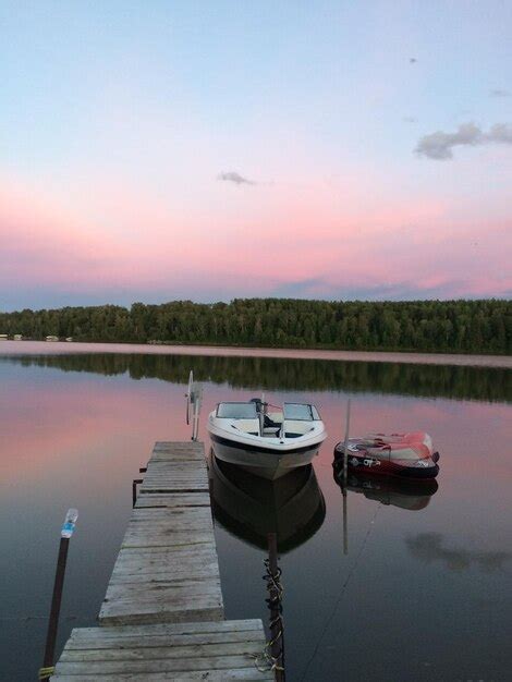 Premium Photo Fall Boat Sunset On Wizard Lake Albert