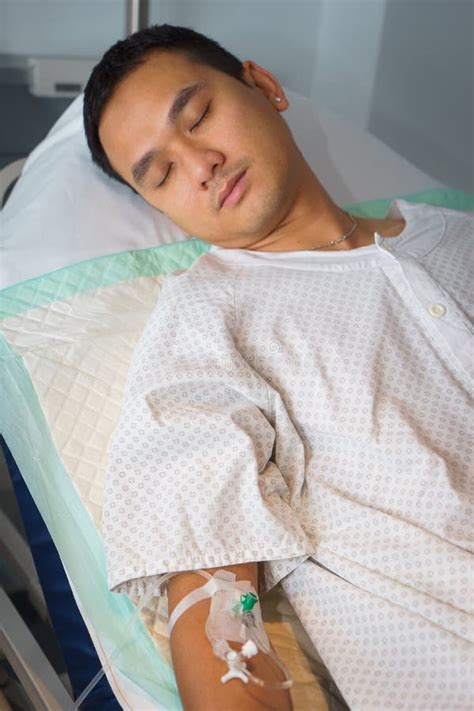 Man Sleeping In Hospital Bed