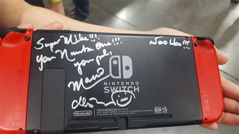 Super Mario signed my Super Mario Odyssey Edition Switch at SLGC! : r ...