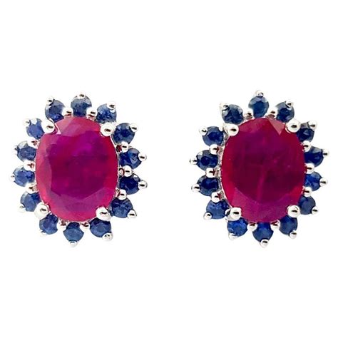 Jewelry set: earrings and ring with rubies and sapphires in 14k gold ...