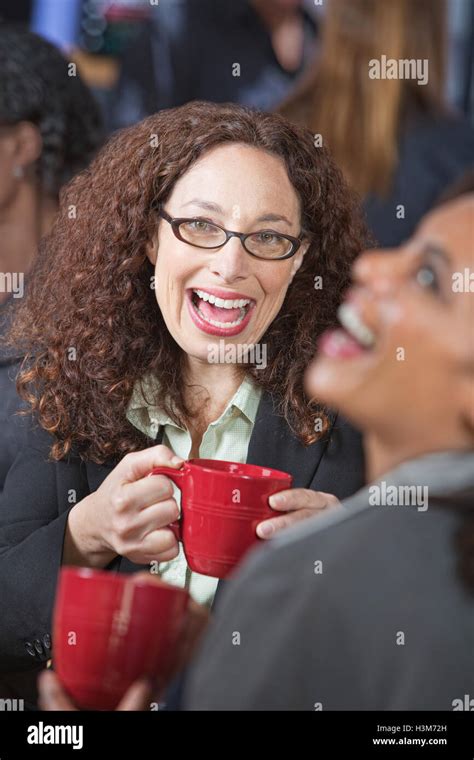 Friends Laughing Together Stock Photo - Alamy