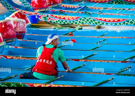 A Row Of Dragonboats In A River In Taipei During The 2019 Taipei Dragon