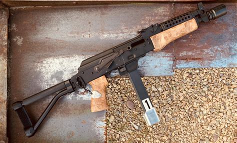 My only pistol caliber AK, Definitive Arms AKX-9. Takes Colt stick mags ...