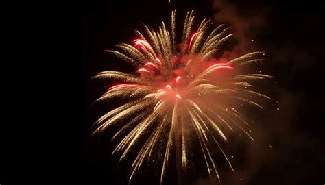 Vibrant Colors Illuminate Exploding Firework Display At Night Generated