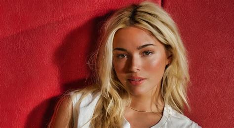 PHOTOS Olivia Dunne Stuns In Tiny White Bikini On The Beach Alongside