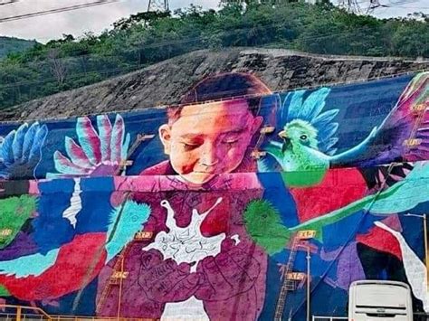 Pintan mega mural en la presa de CFE Chicoasén