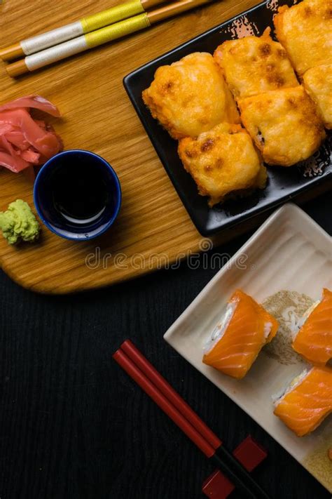 Mix Of Sushi With Cheese Salmon Shrimps Avokado Cucumber Japan