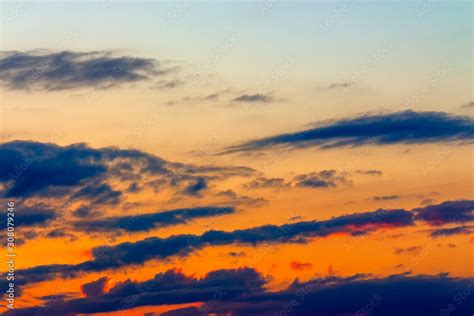 orange sunset sky with clouds. beautiful nature background Stock Photo ...