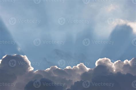 Blue Sky with Clouds and Sun Rays 16306048 Stock Photo at Vecteezy