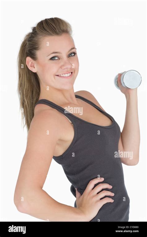 Woman Lifting Dumbbell Stock Photo Alamy