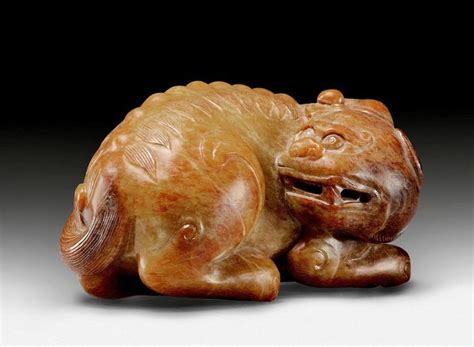 A Mottled Brown Jade Carving Of A Mythical Beast China Ming Dynasty