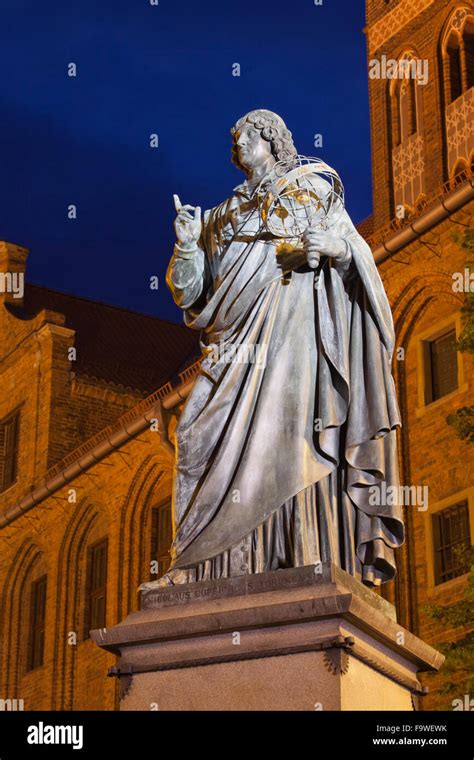 Poland, Torun, monument of Nicolaus Copernicus at night Stock Photo - Alamy