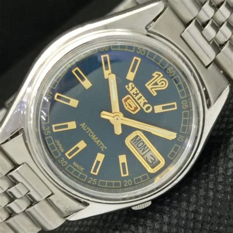 GENUINE VINTAGE SEIKO 5 AUTO 7009A JAPAN MENS DAY DATE BLUE WATCH 595a