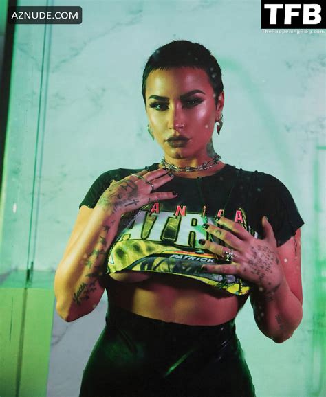 Demi Lovato Sexy Poses Showing Off Her Big Boobs And Hot Legs In The