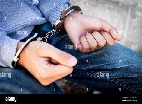 Handcuffed Hands Man Hi Res Stock Photography And Images Alamy