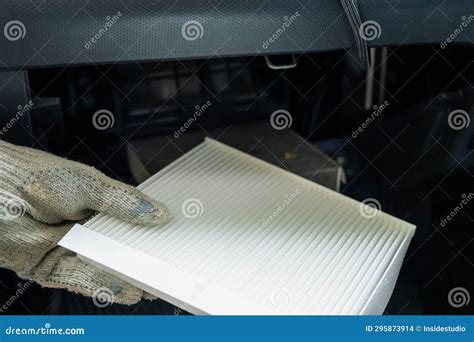 A Mechanic Changes the Cabin Air Filter of a Car. Stock Photo - Image ...