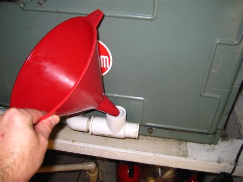 how to clean ac drain pipe