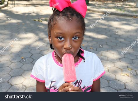 Black Child Eating Ice Cream Over 1295 Royalty Free Licensable Stock