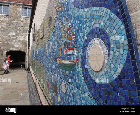 Visitors Look At The Fantastic Seafaring Theme Mosaic At The Entrance