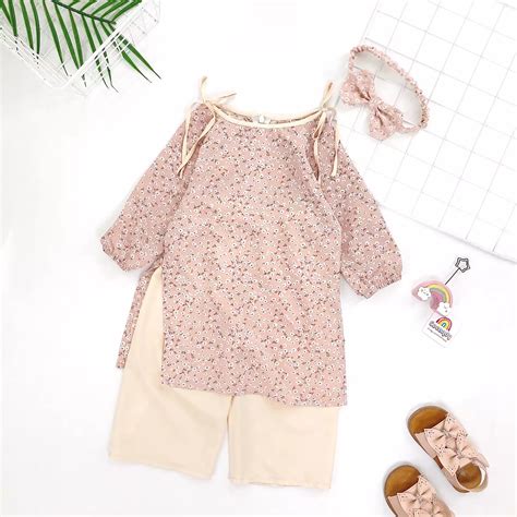 Áo dài hoa nhí nơ vai quần HỒNG NUDE kèm nơ cocandy