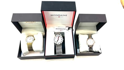 Selection Of Boxed Watches Includes His And Hers Mondaine Helvetica