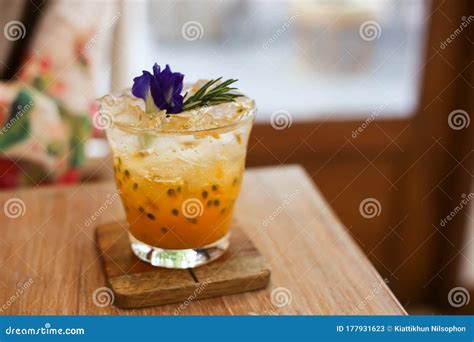 Passion Fruit Juice Iced In A Glass On Wooden Table In Cafe Stock Image Image Of Leaf