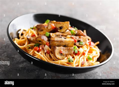 Vegetarian Spaghetti Bolognese With Mushrooms And Pepper Stock Photo