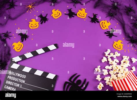 Movie Clapper Board In Spider Webs Spiders Ghost Eyes On Purple