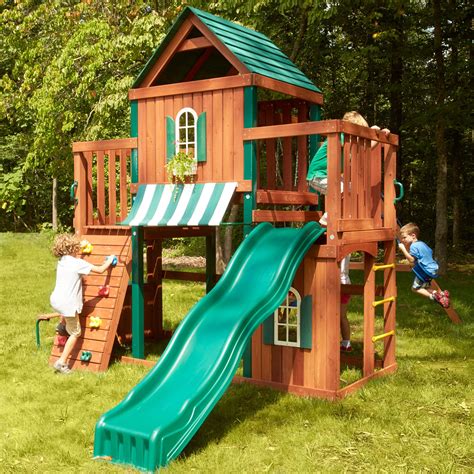 Winchester Wood Complete Play Set With Two Swings Slide Rock Wall Picnic Table And Glider